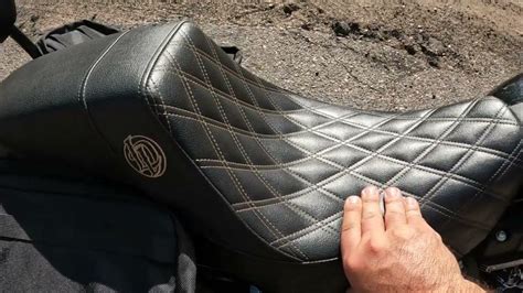 It is a molded fiberglass shell with nice covering material. . Lucky daves seat review